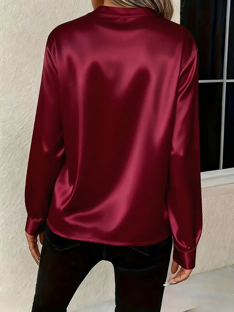 Claudine — Blusa satinada elegante y atemporal