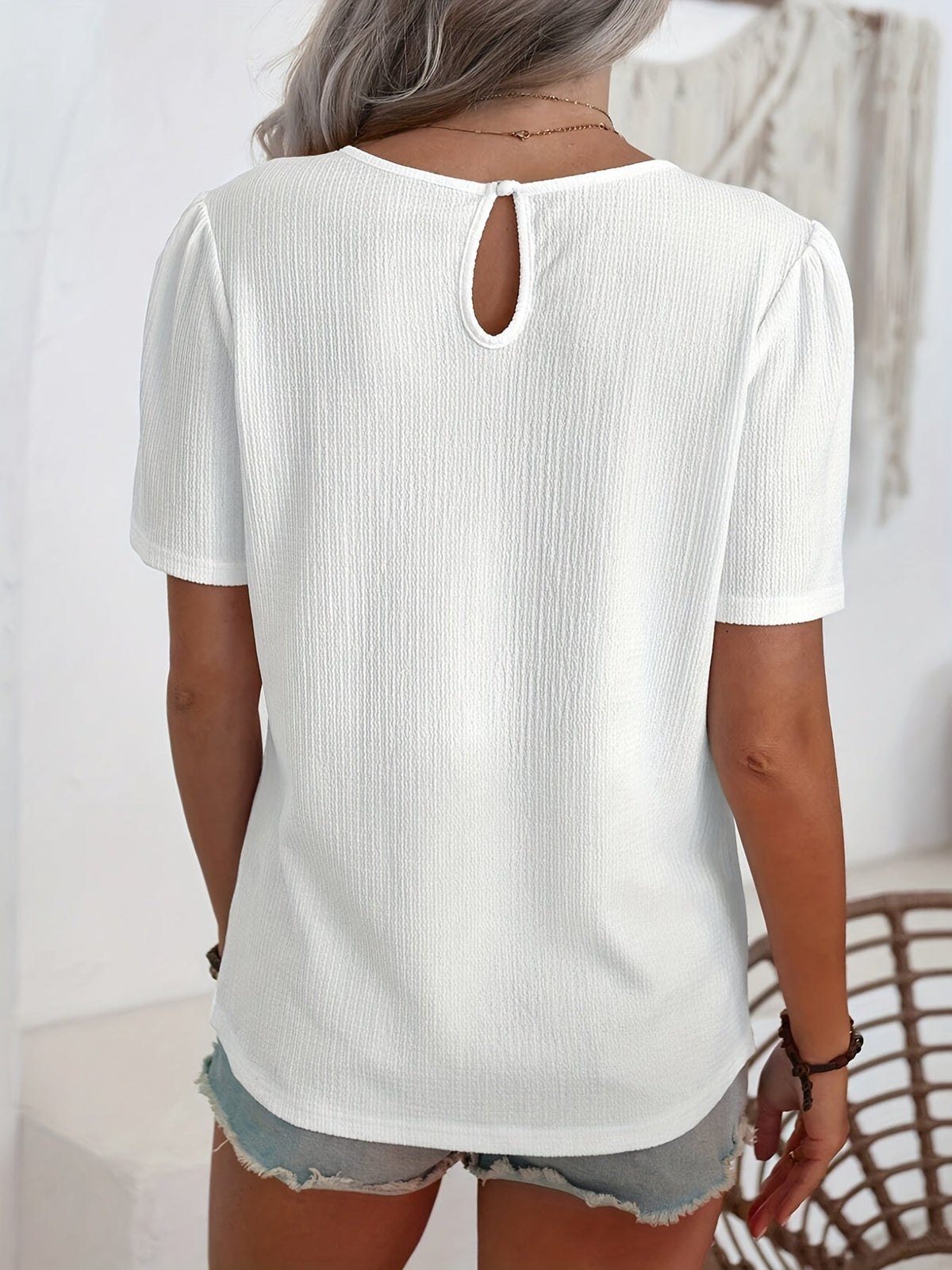 Noémie — T-shirt elegante con textura sutil