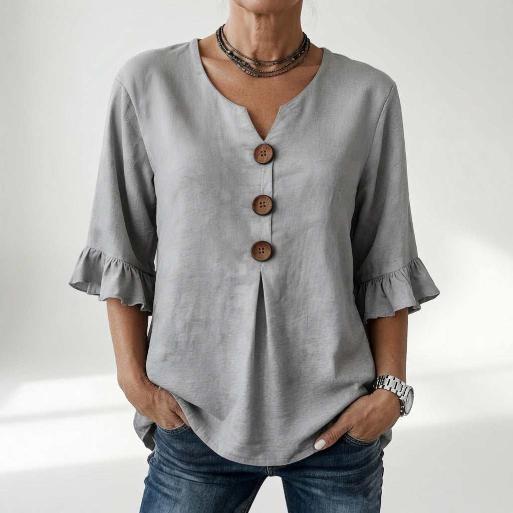 Rosanne — Blusa amplia con botones y mangas volantes
