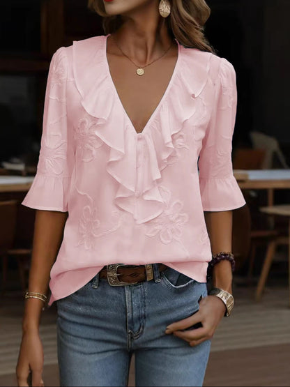 Isaline — Blusa elegante con volantes