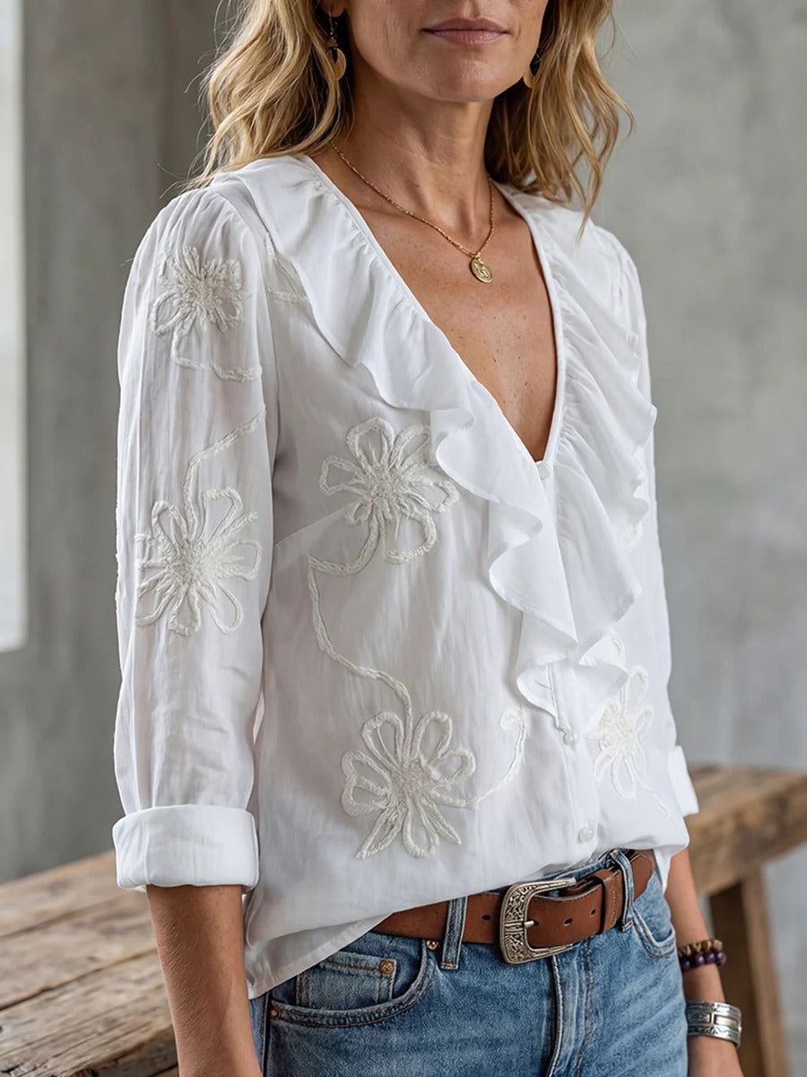 Isaline — Blusa elegante con volantes