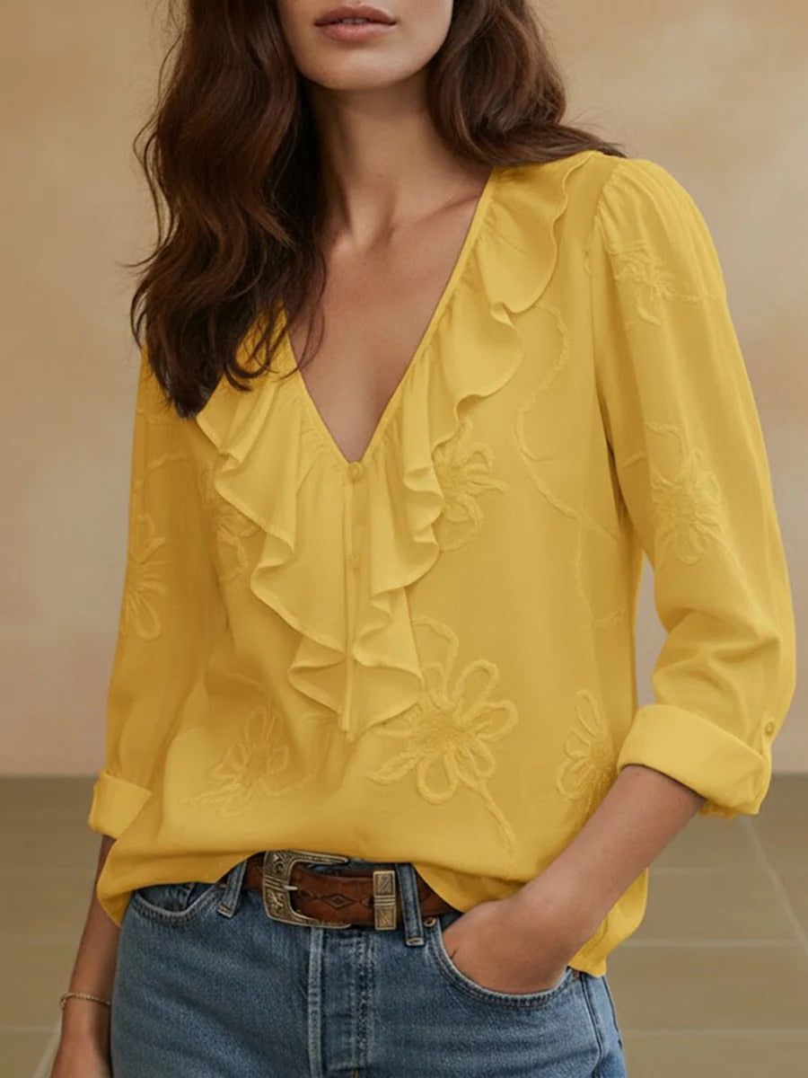 Isaline — Blusa elegante con volantes