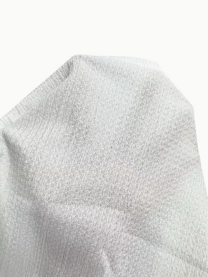Noémie — T-shirt elegante con textura sutil