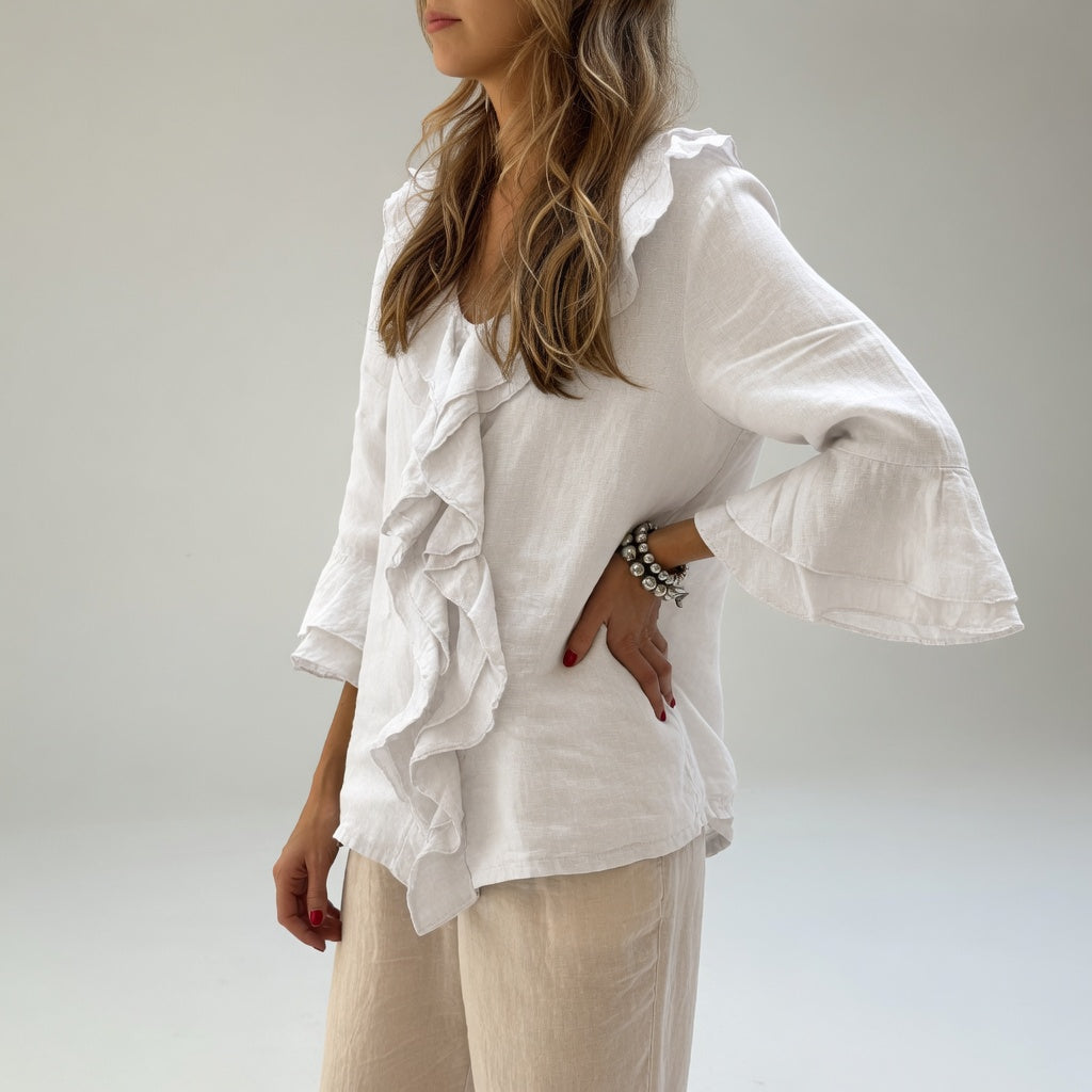 Apolline — Blusa fluida con cuello volante elegante