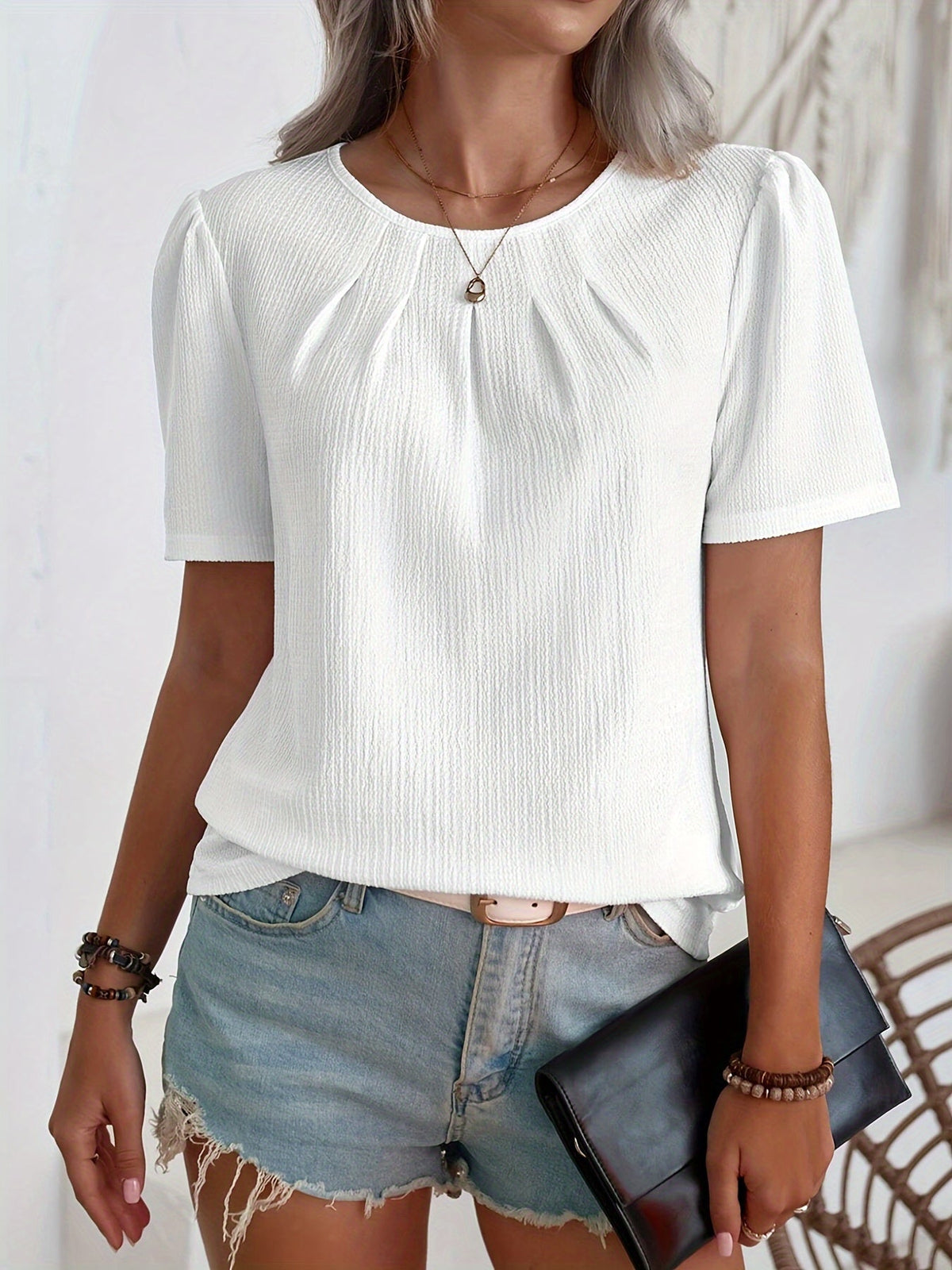 Noémie — T-shirt elegante con textura sutil