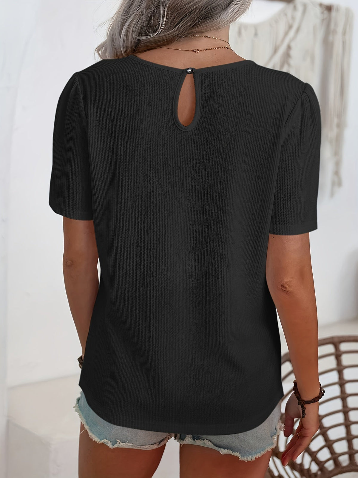 Noémie — T-shirt elegante con textura sutil