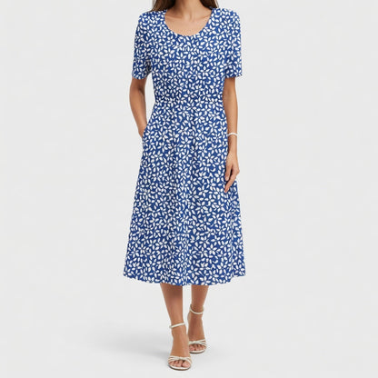 Doreen — Vestido midi elegante con volantes